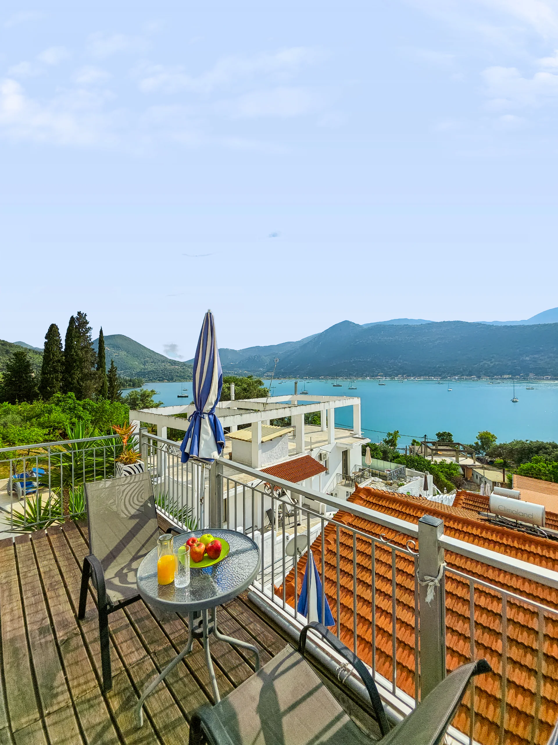 Sofita Apartment: view across Geni Bay and the green hills of Lefkada