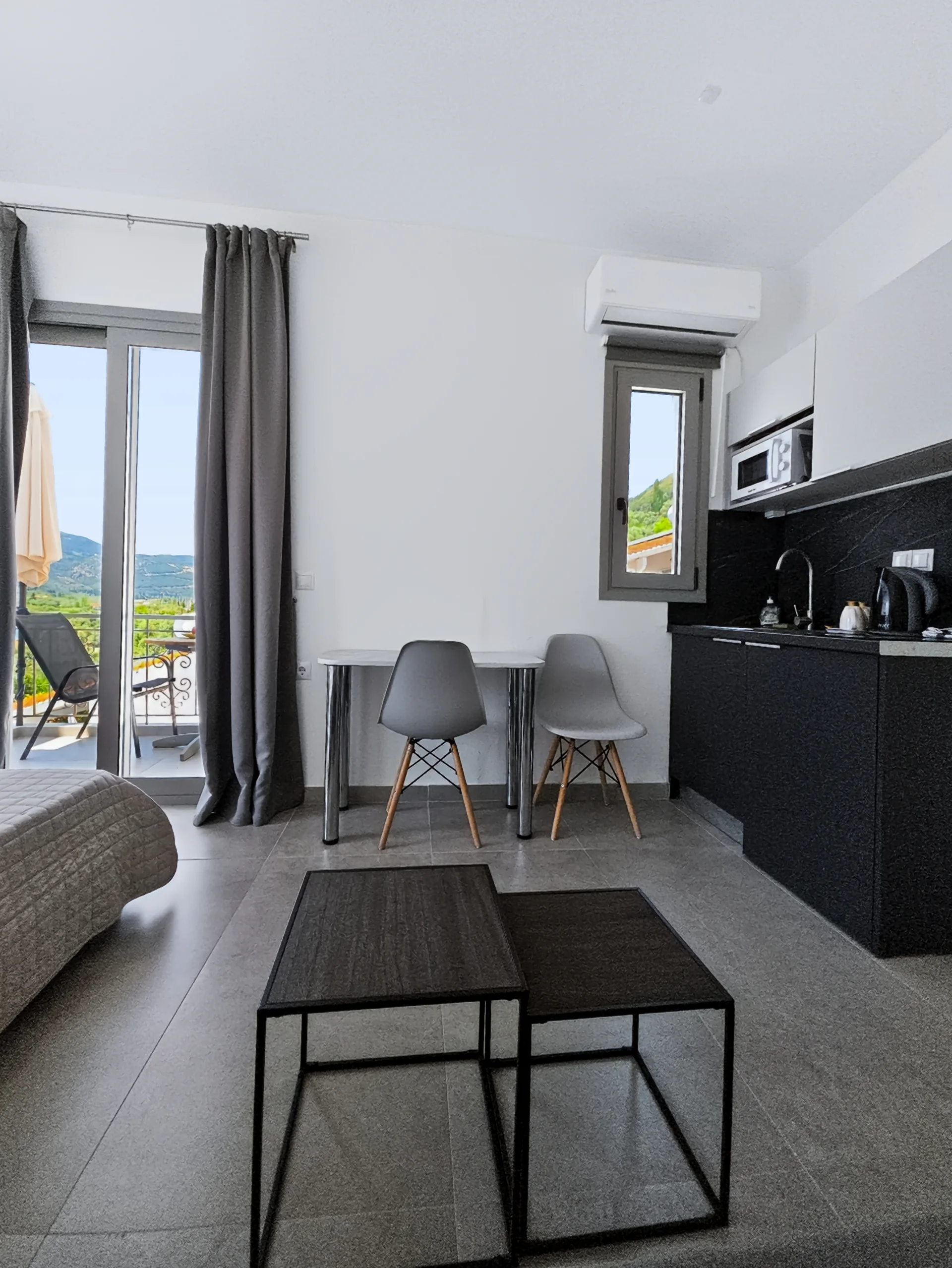 Studio 1: open-plan sleeping and living area at Chakalaka Resort