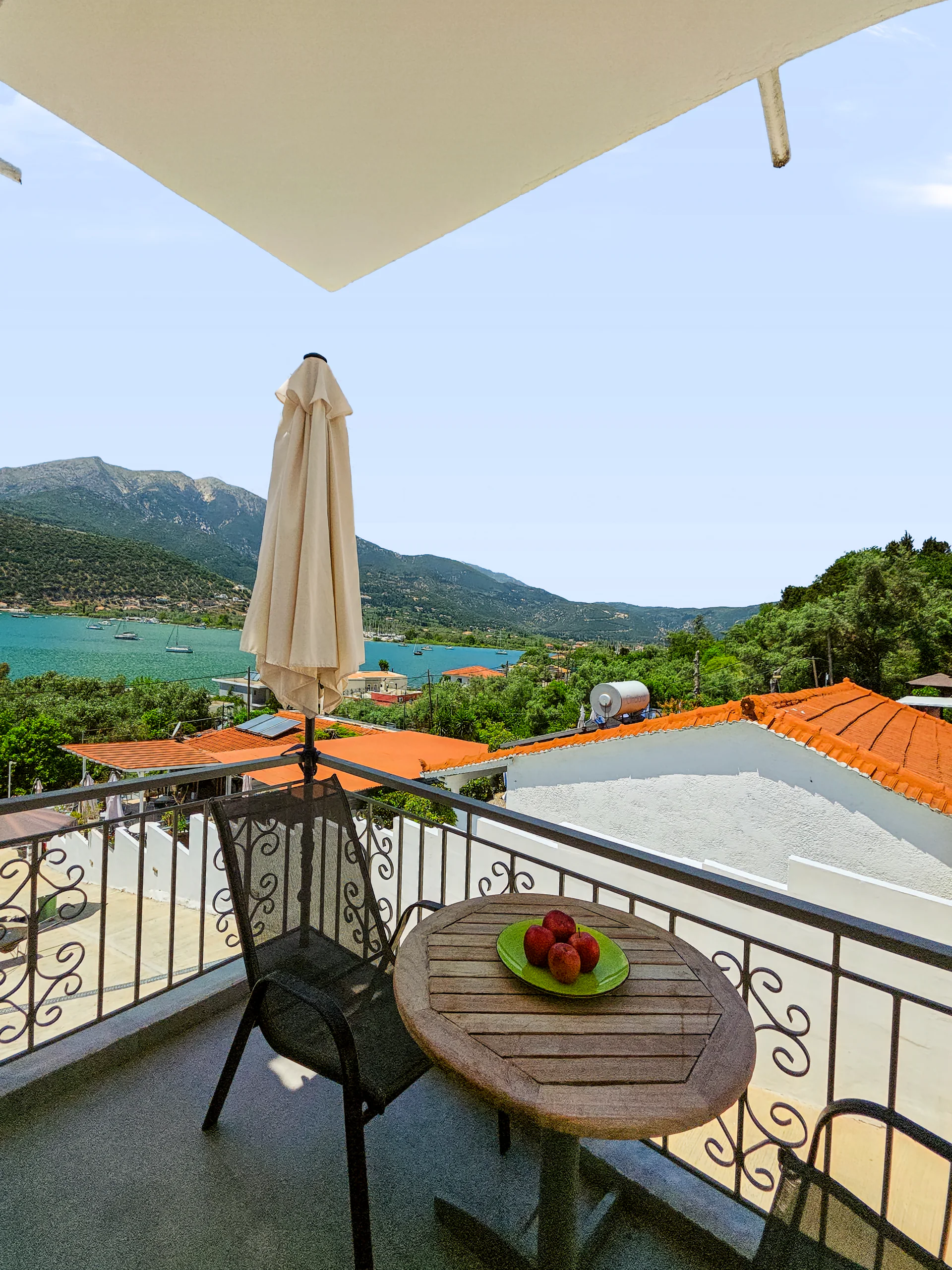 Studio 1: private balcony seating overlooking Geni Bay in Lefkada