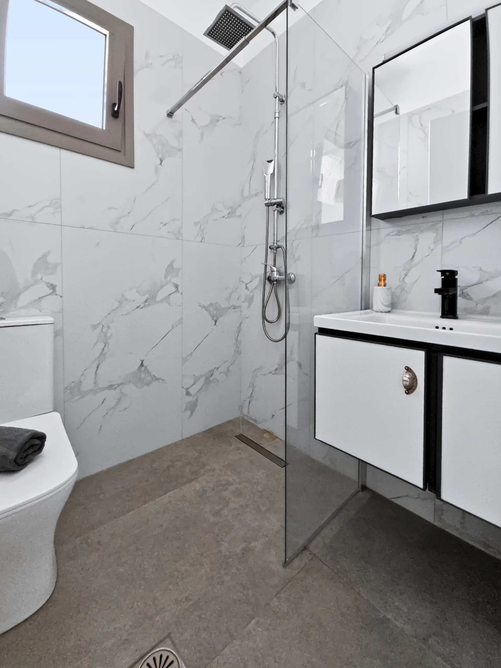Studio 1: bright private bathroom with a walk-in shower