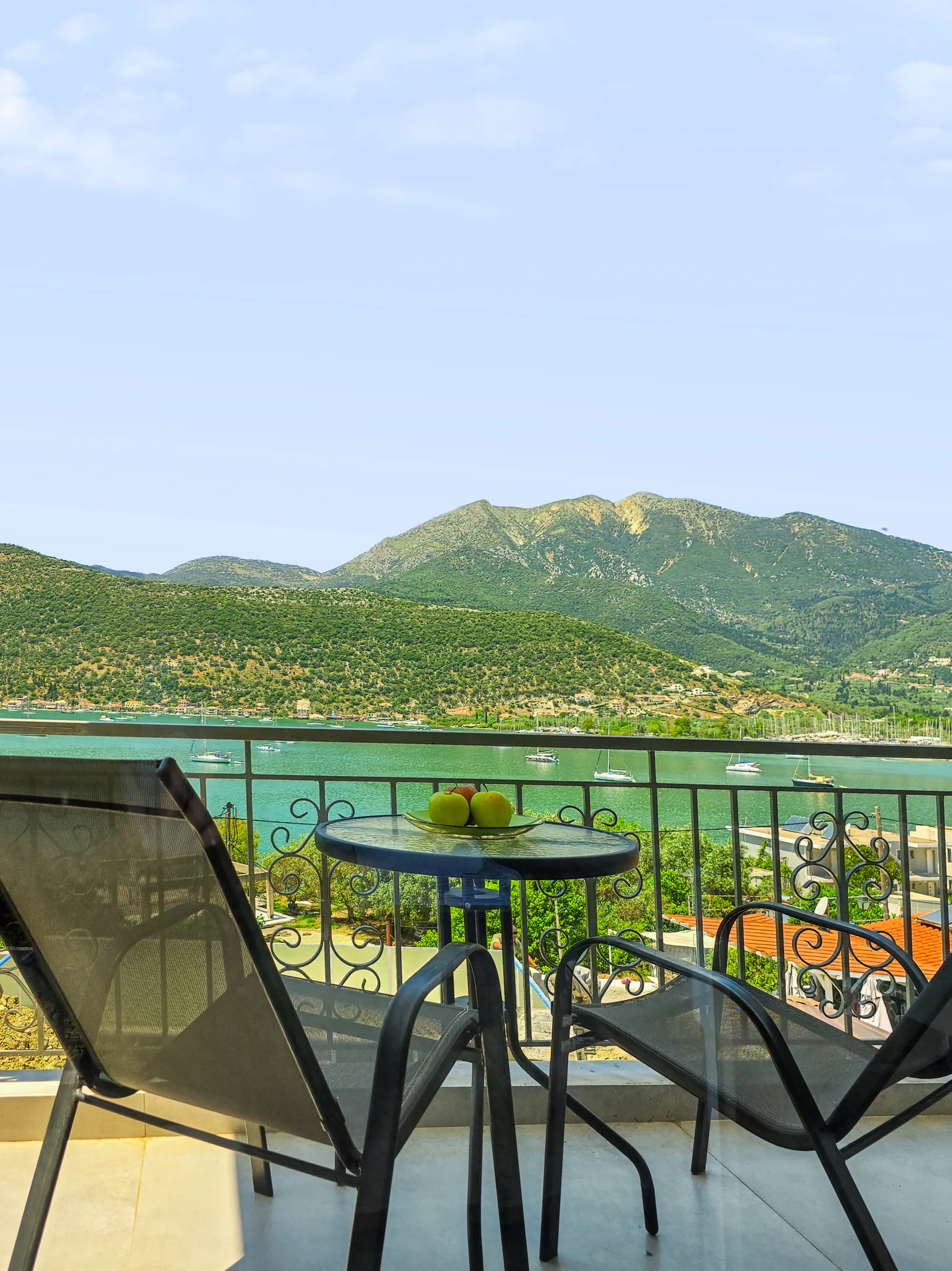 Studio 2: private balcony seating overlooking Geni Bay in Lefkada