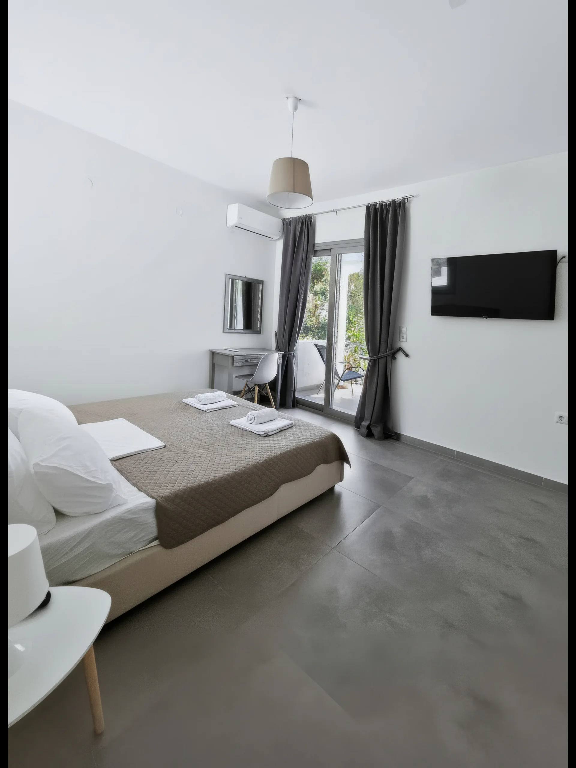 Studio 3: double bed beside the sea-view balcony in Geni, Lefkada