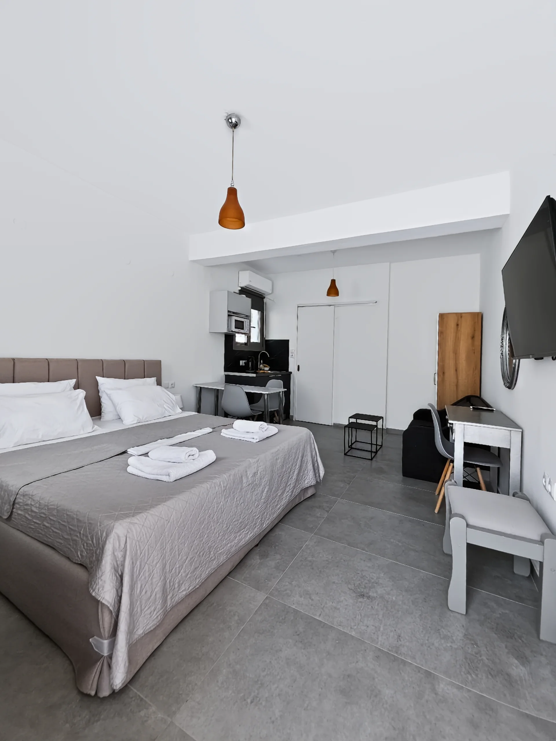 Studio 4: open-plan sleeping and living area at Chakalaka Resort