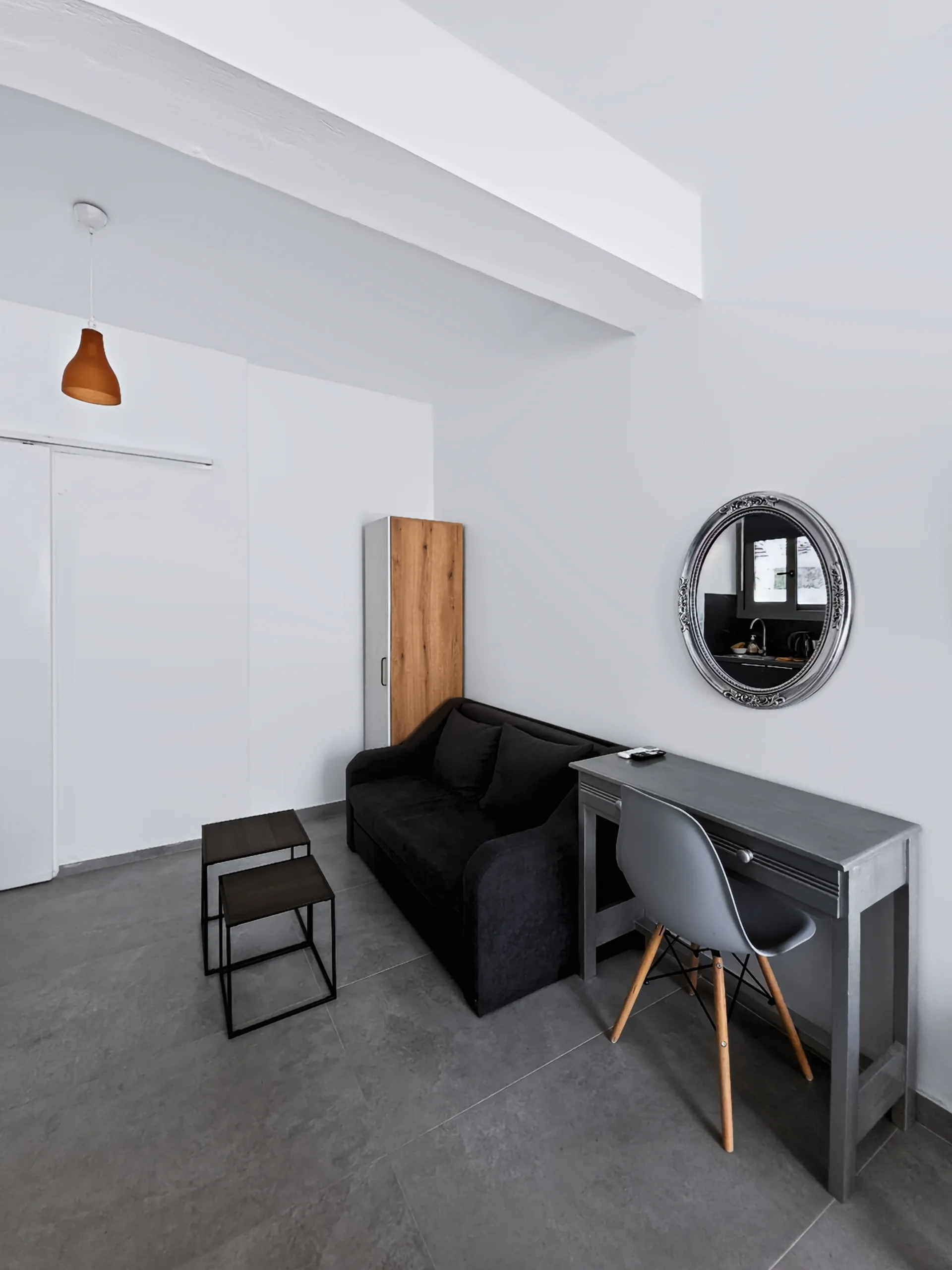 Studio 4: sofa bed and seating area inside the studio