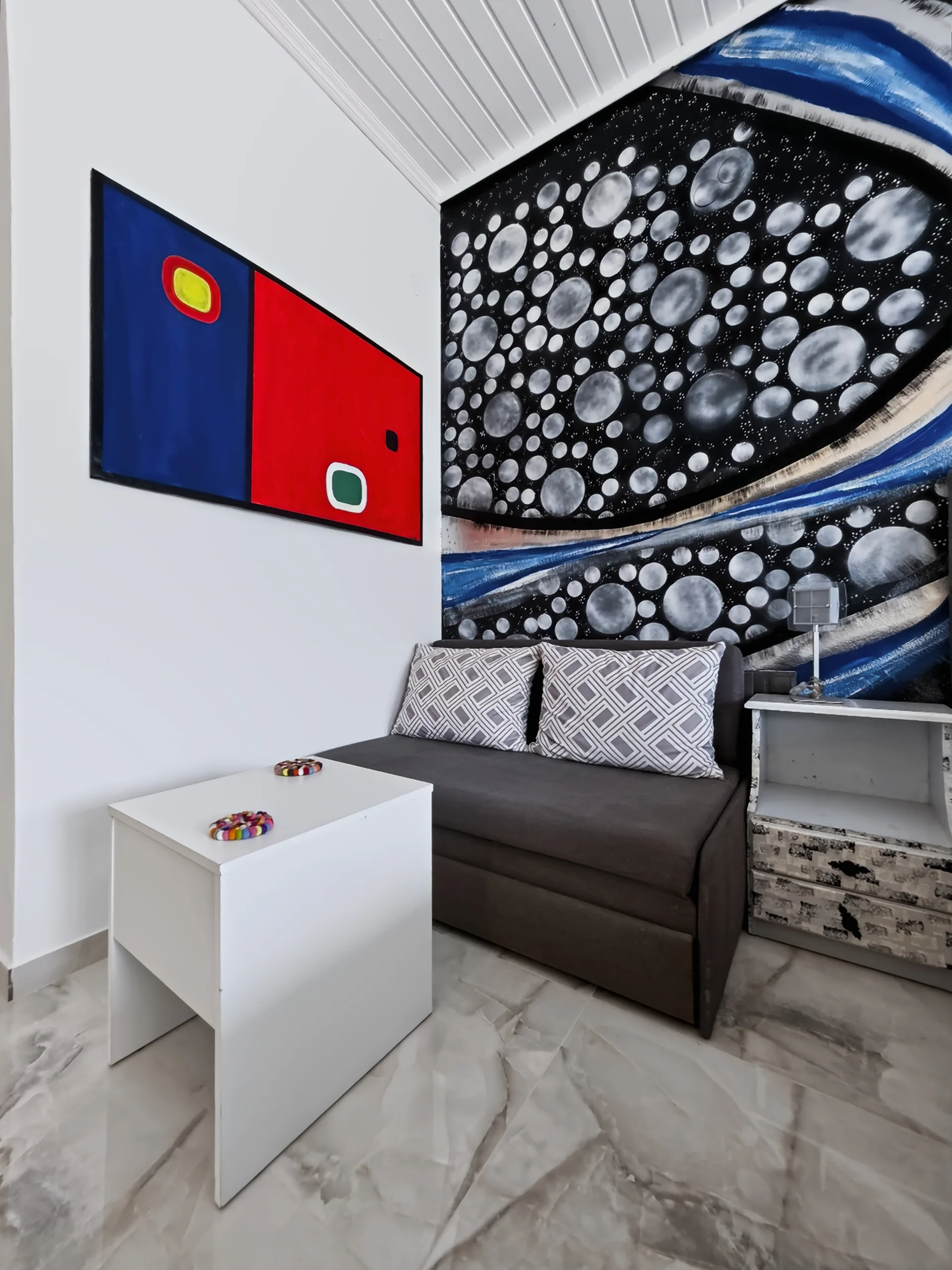 Studio 13: sofa bed and seating area inside the studio