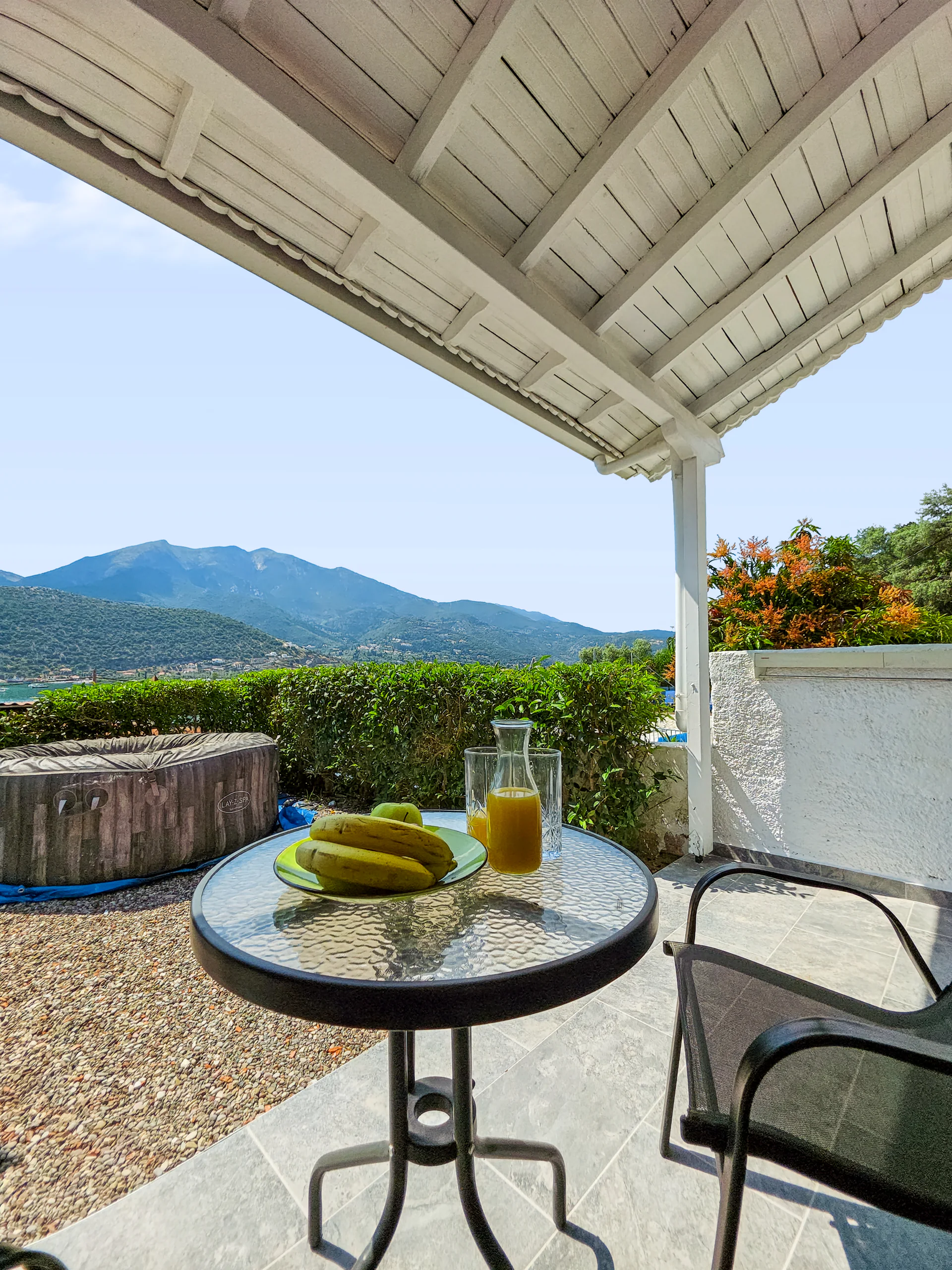 Studio 14: view across Geni Bay and the green hills of Lefkada