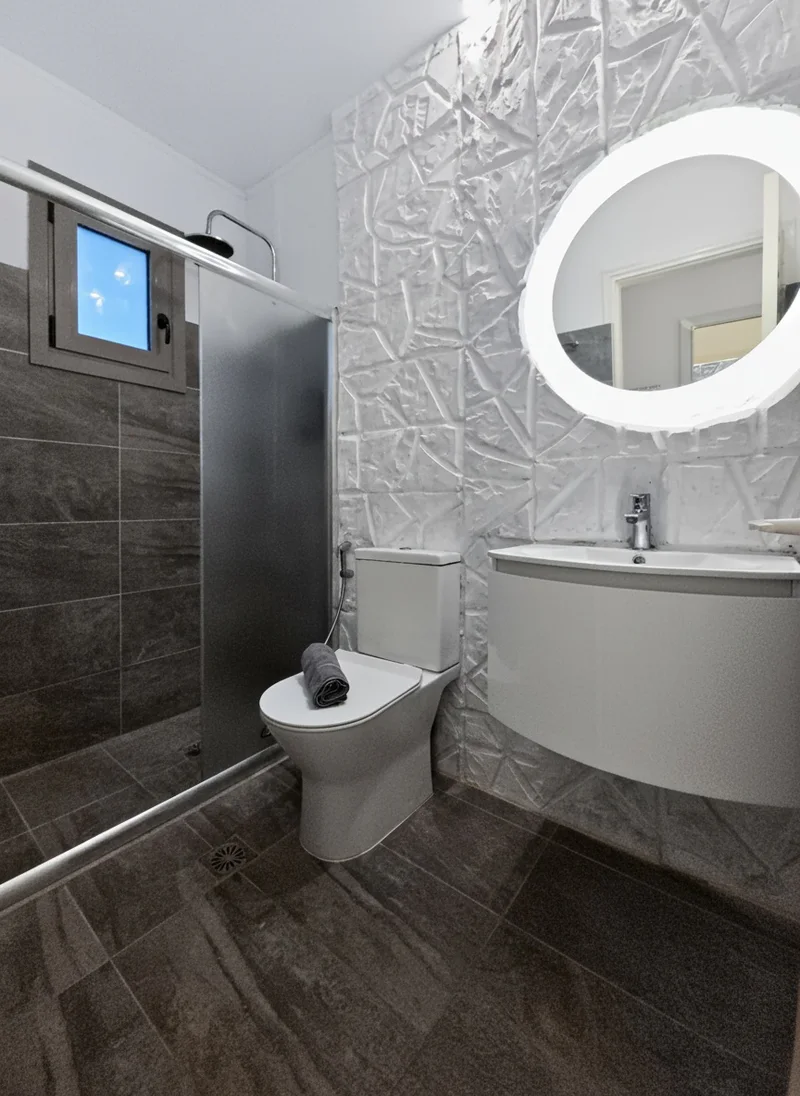 Studio 15: bright private bathroom with a walk-in shower