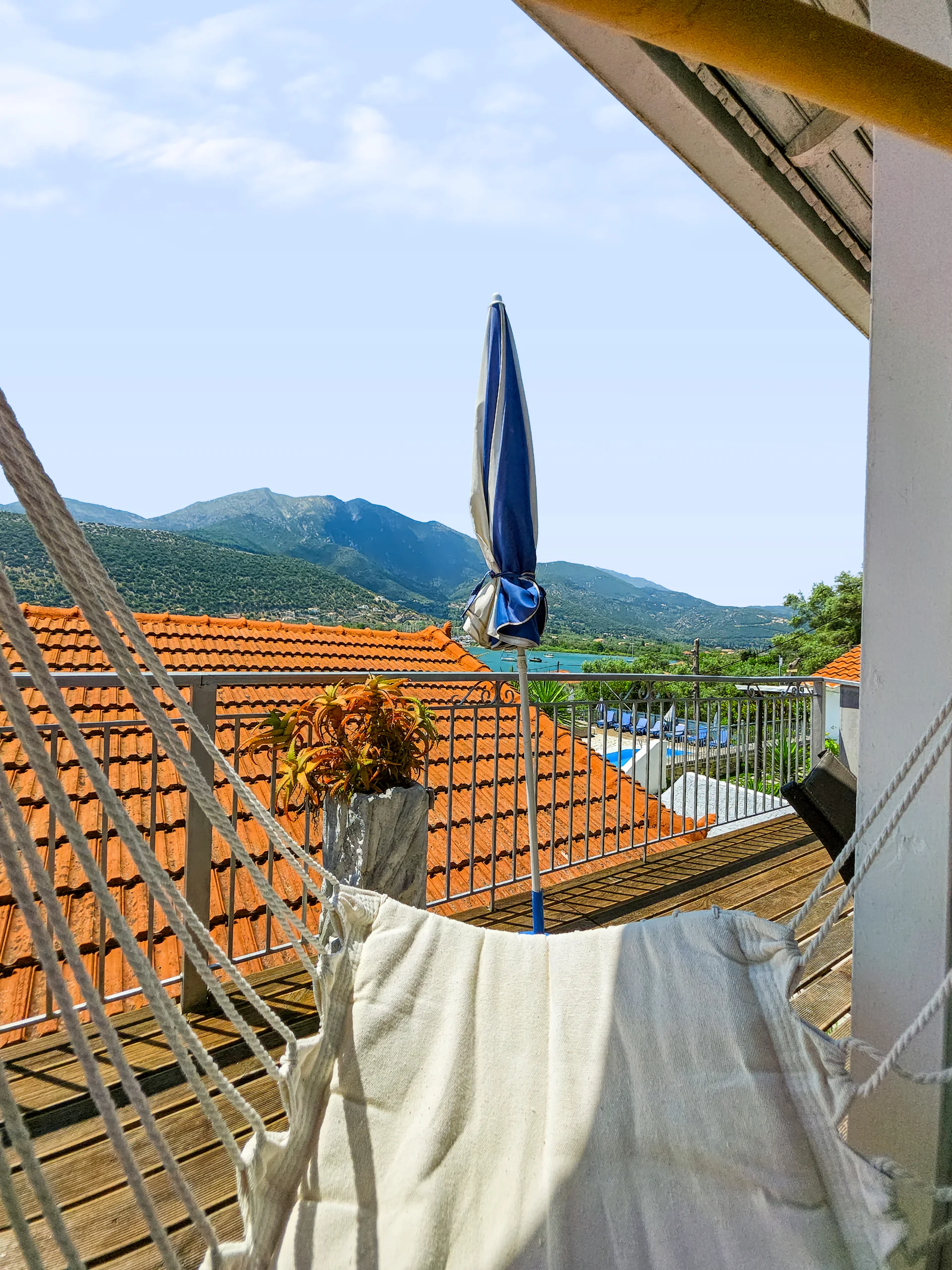 Studio 16: view across Geni Bay and the green hills of Lefkada
