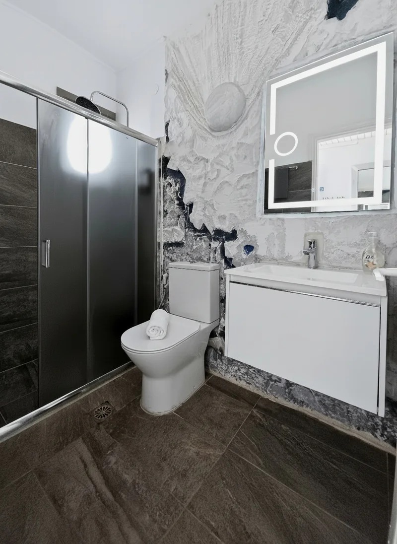 Studio 17: bright private bathroom with a walk-in shower