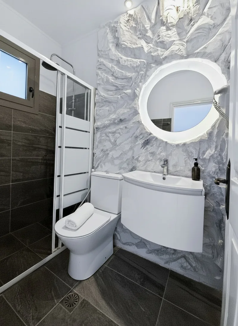 Studio 20: bright private bathroom with a walk-in shower