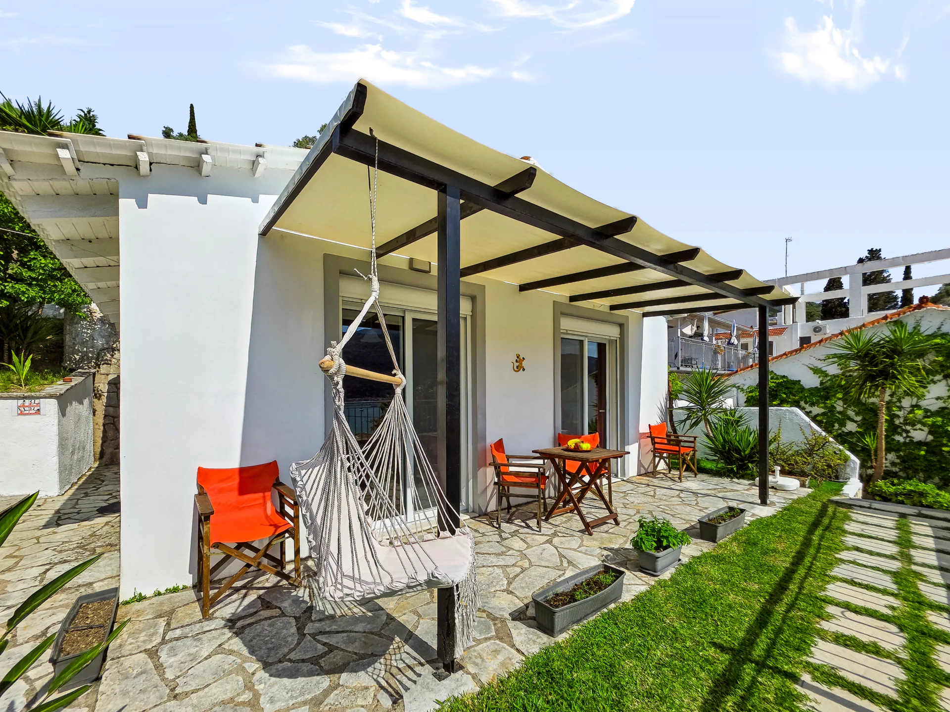 Villa 1: private garden and stone terrace at Chakalaka Resort