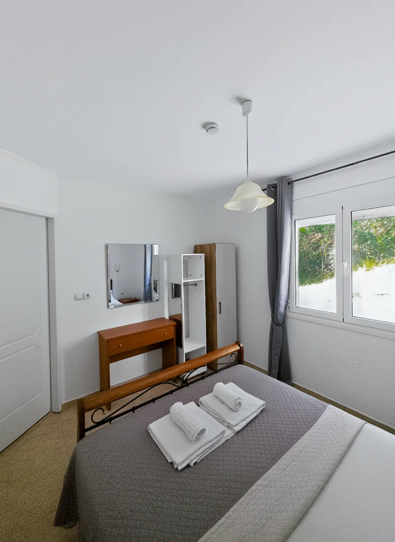 Villa 2: prepared double bedroom at Chakalaka Resort in Geni