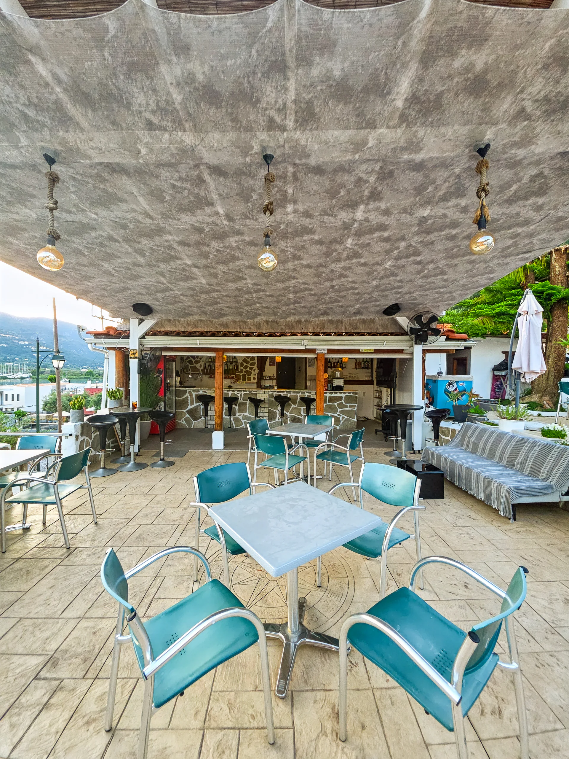 The open-air pool bar and terrace above Geni Bay at Chakalaka Resort