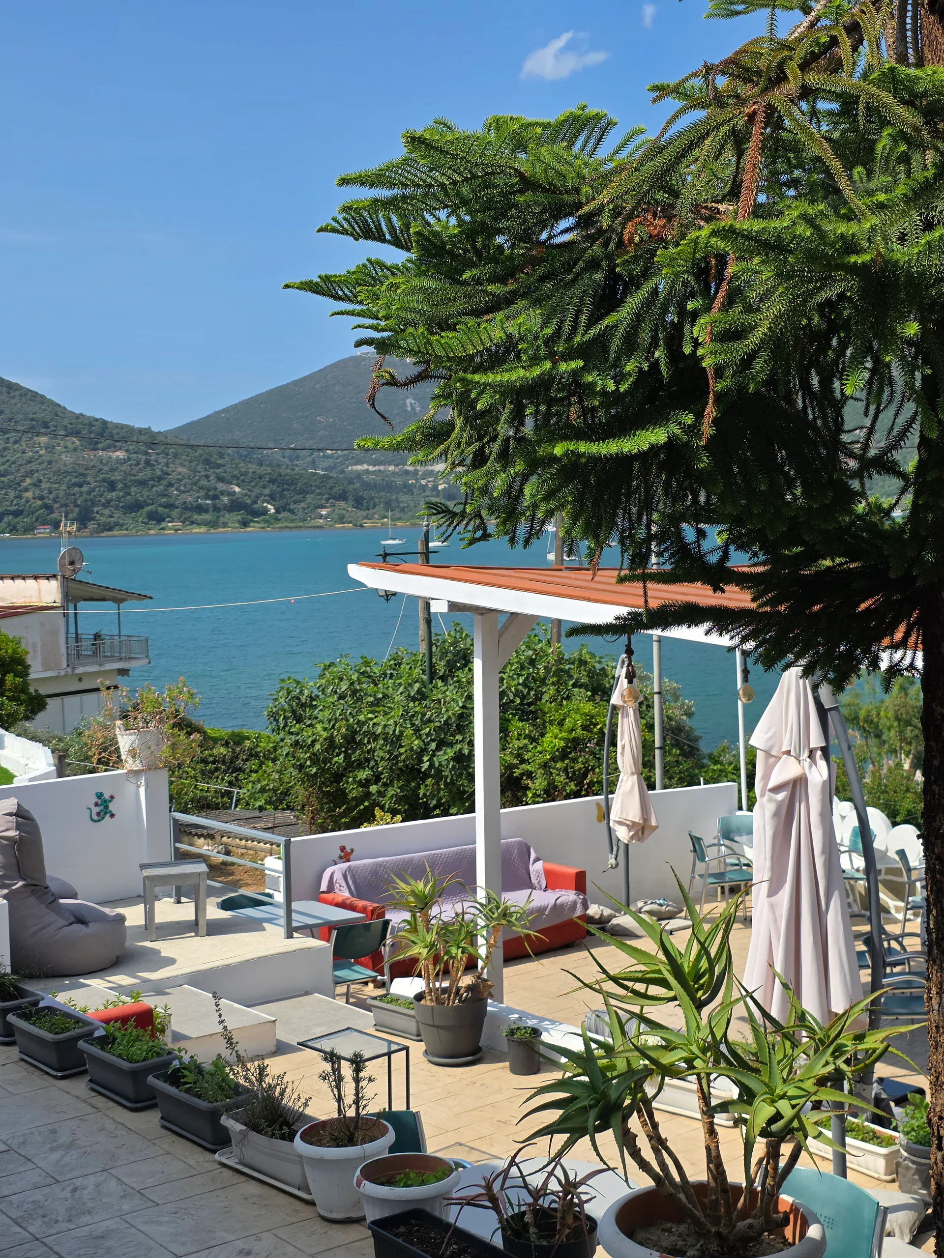 The open-air pool bar and terrace above Geni Bay at Chakalaka Resort